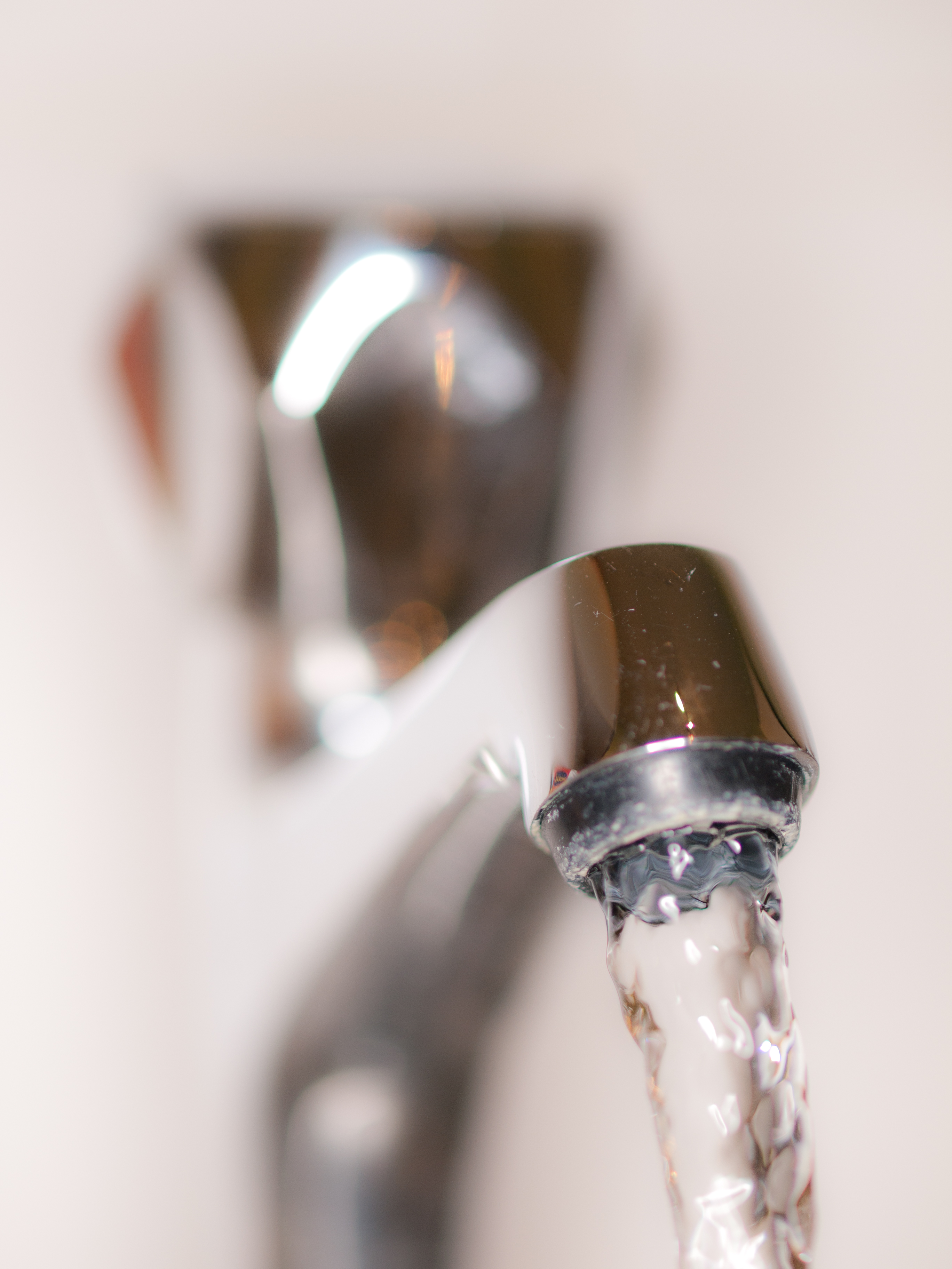 Kitchen tap with water running
