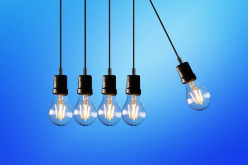 five energy saving light bulbs lined up