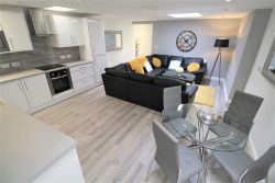 living room and kitchen area of a 4 bedroom apartment in wavertree