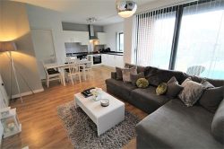 living, dining and kitchen area of a 2 bedroom apartment in the baltic triangle area of liverpool